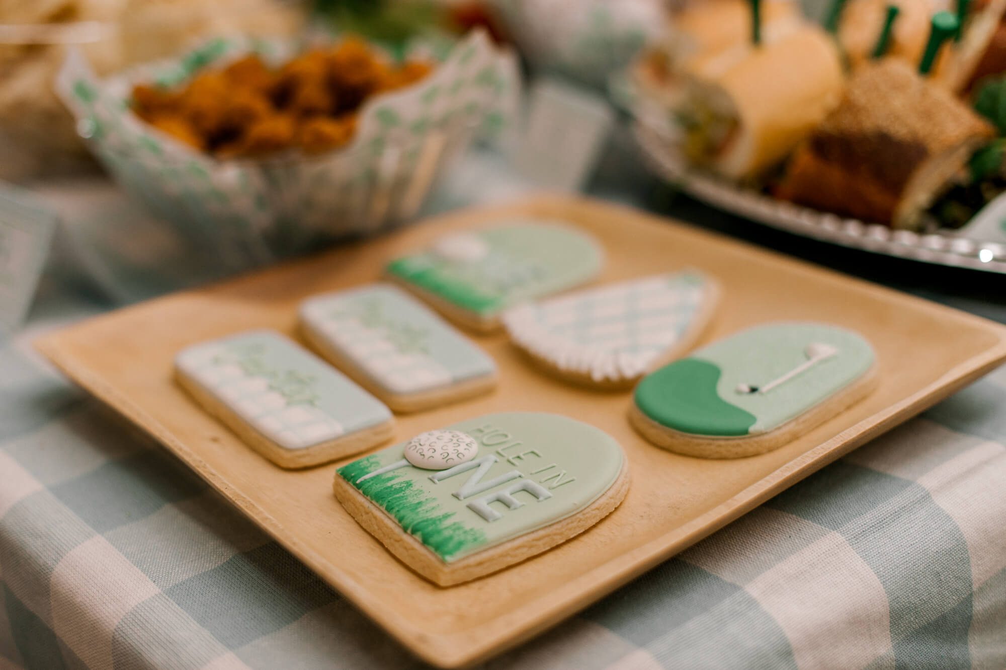 Hole in One themed first birthday party cookies from a recent session as an Orlando baby photographer.
