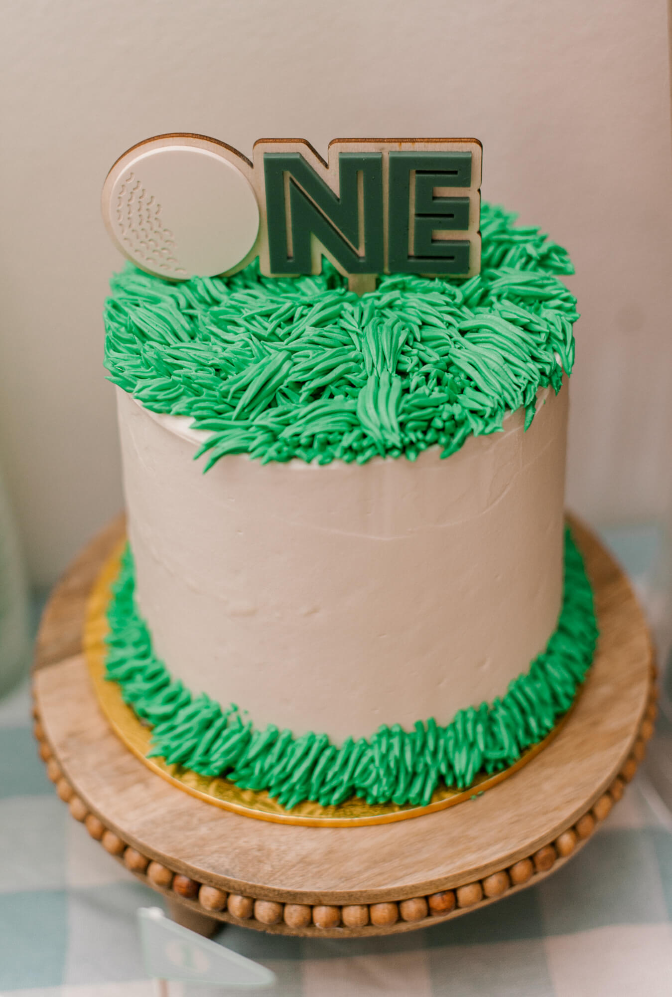 Golf themed first birthday cake I documented as an Orlando baby photographer. 