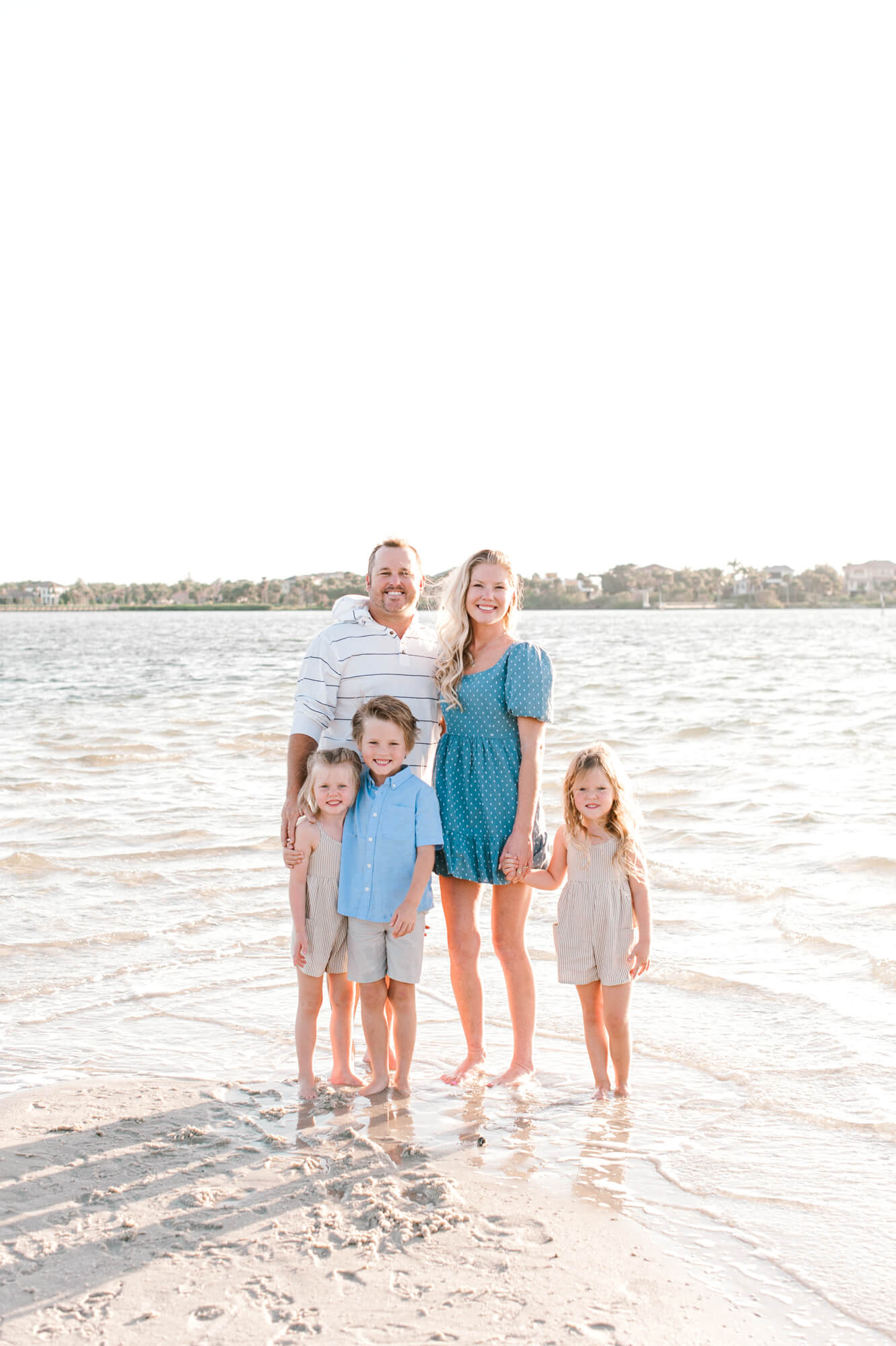 Family of five poses for a photo on Bird Island and thinks about continuing healthcare with integrative medicine at the Franz Center in Orlando. 