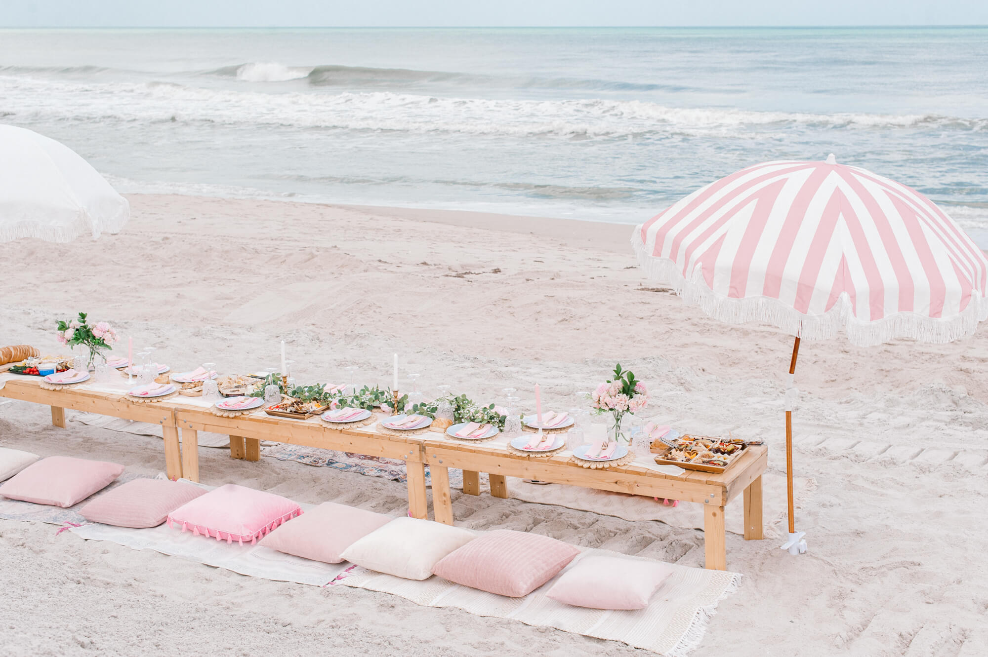 Such a beautiful picnic setup by A Picnic Affair on Melbourne Beach, Florida.
