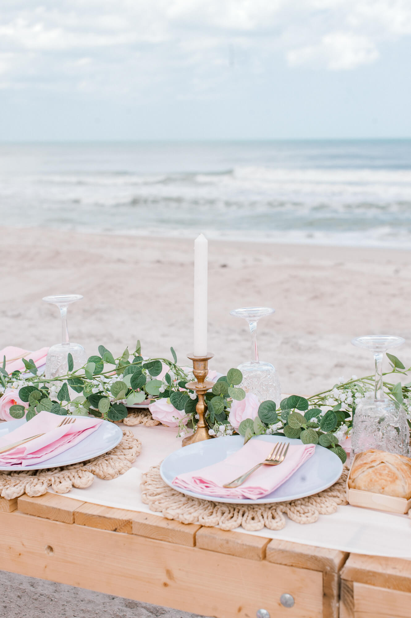Close up of the table at a 50th birthday celebration on the beach east of Orlando with A Picnic Affair. 