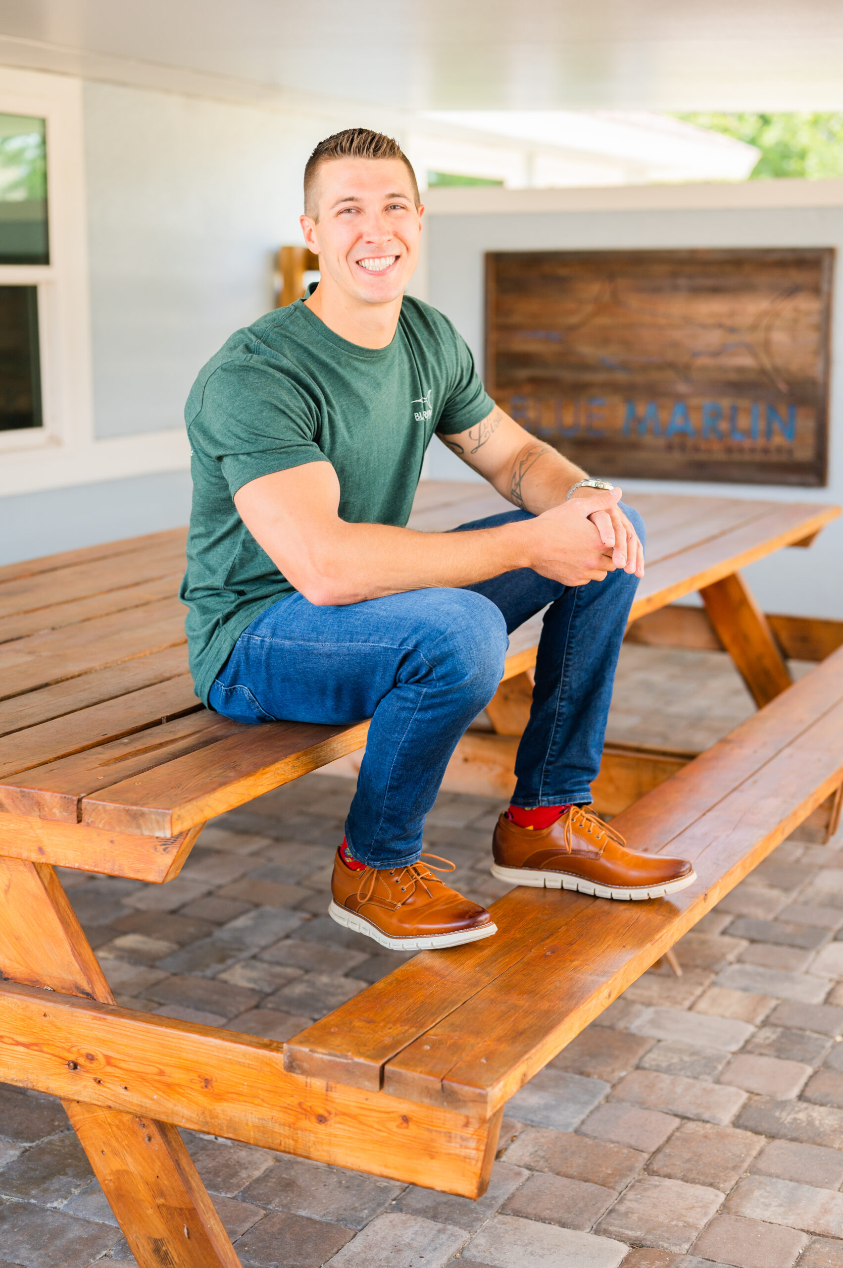 Photo of Dillon Bout Realtor with Blue Marlin Real Estate sitting on a table 